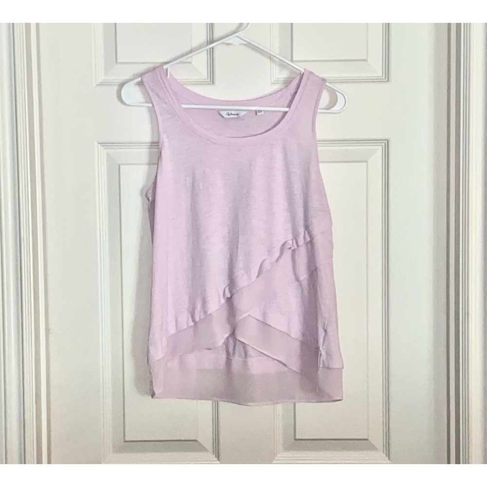 Ricki’s Lilac tank with decorative ruffles and sheer bottom. Size M Petite.